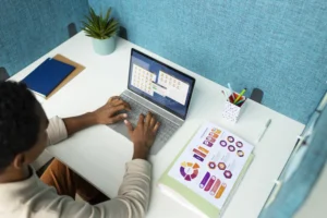 high-angle-woman-working-laptop