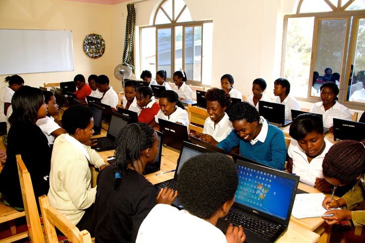 Students collaborating on a digital research project, reflecting 21st-century learning skills